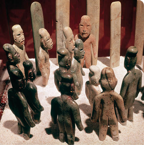 Olmec Offering of Figurines --- Image by   Gianni Dagli Orti CORBIS